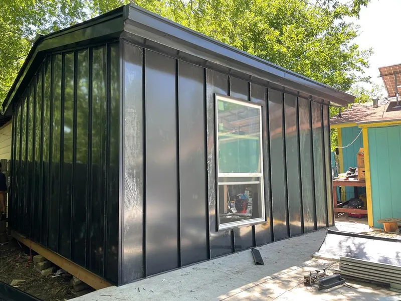 Black standing seam metal wall panels for Roof Inspection in Oakdale