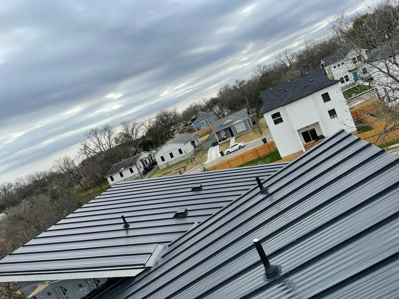 Standing seam metal roof panels with vents for Skylight Repair in Oakdale